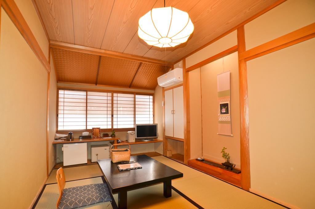 Готель Kunisaki Ундзен Номер фото
